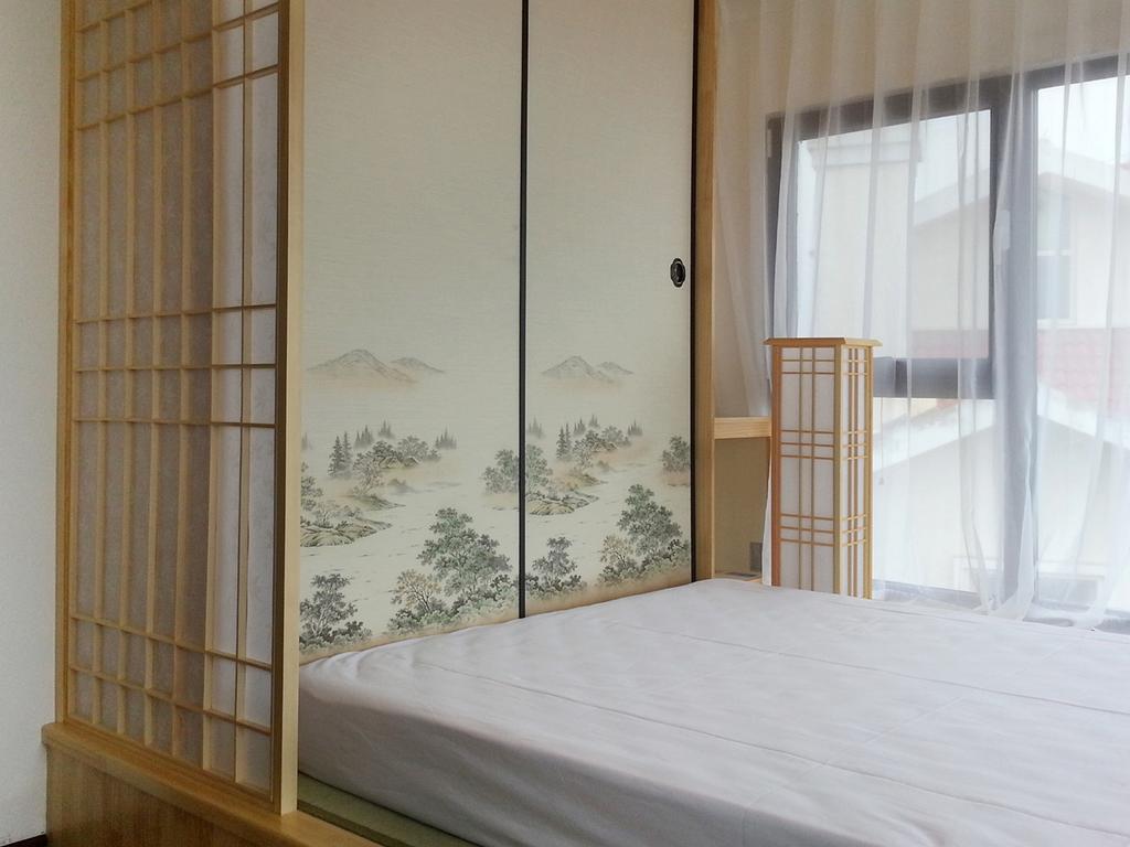 Villa Inn No.21 Seaside Qingdao Rom bilde